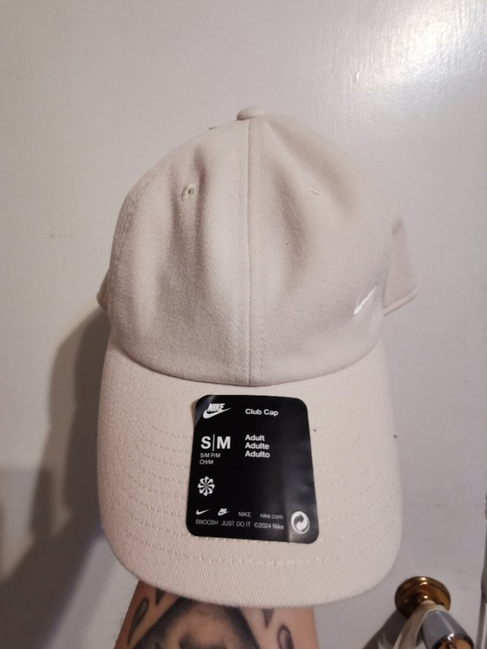 Cream Nikes hat